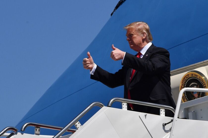 US President Donald Trump arrives at Palm Beach International Airport in Florida on March 22, 2019. (Photo by Nicholas Kamm / AFP)NICHOLAS KAMM/AFP/Getty Images ** OUTS - ELSENT, FPG, CM - OUTS * NM, PH, VA if sourced by CT, LA or MoD **