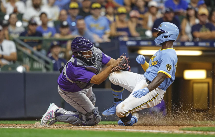 Brewers strengthen leadership after beating Rockies 6-5 in 13