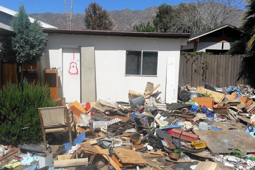 The house at 11006 N. Eldora, L.A., was occupied by squatters for two years, neighbors say. This is the mess neighbors say was left behind.