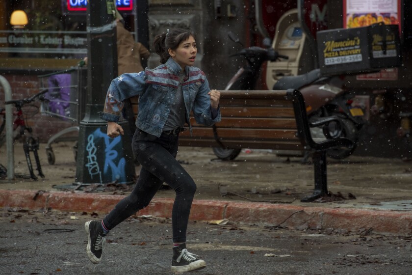 A girl running down the street