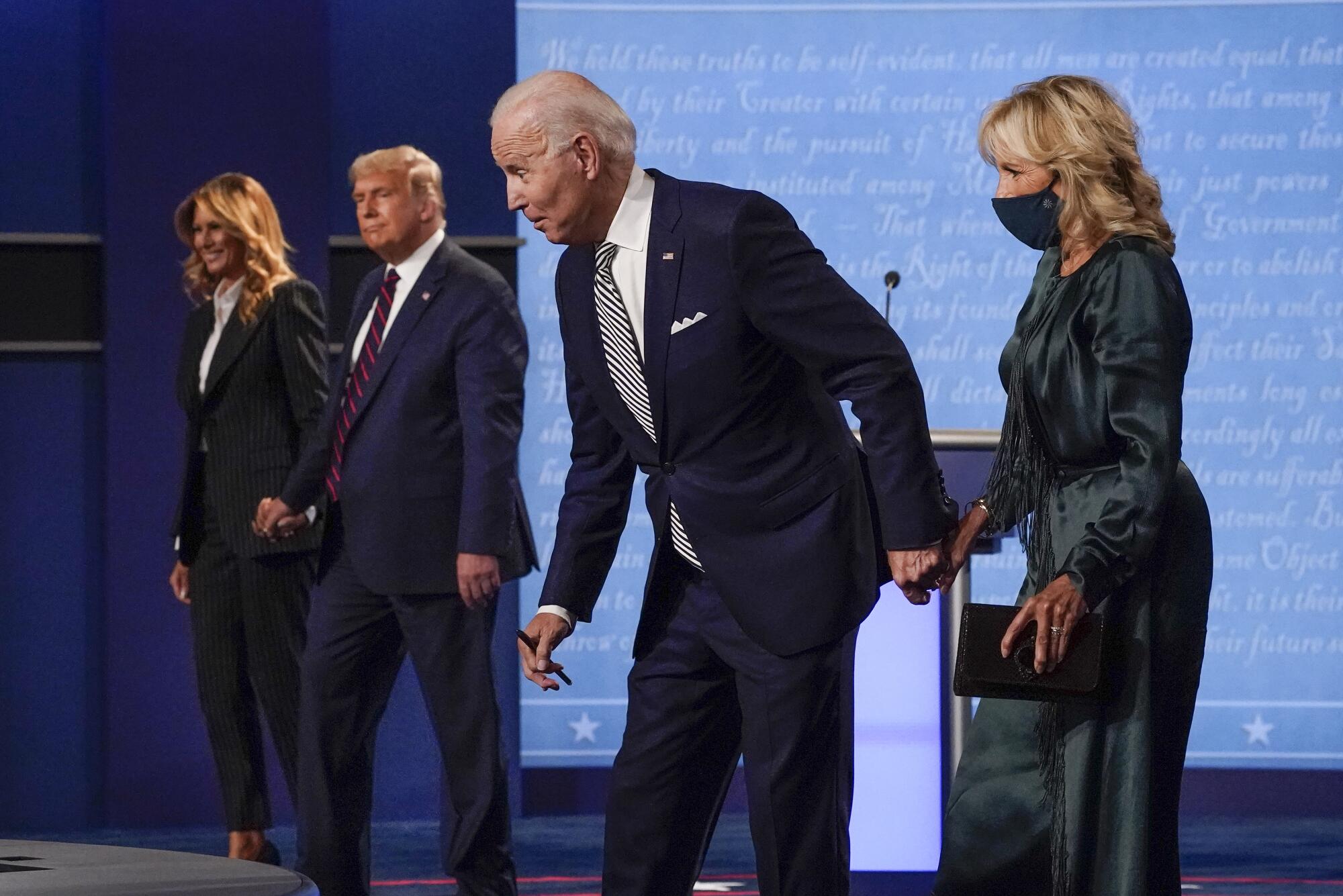 Melania Trump, President Trump, Democratic presidential candidate Joe Biden and Jill Biden after Tuesday's debate
