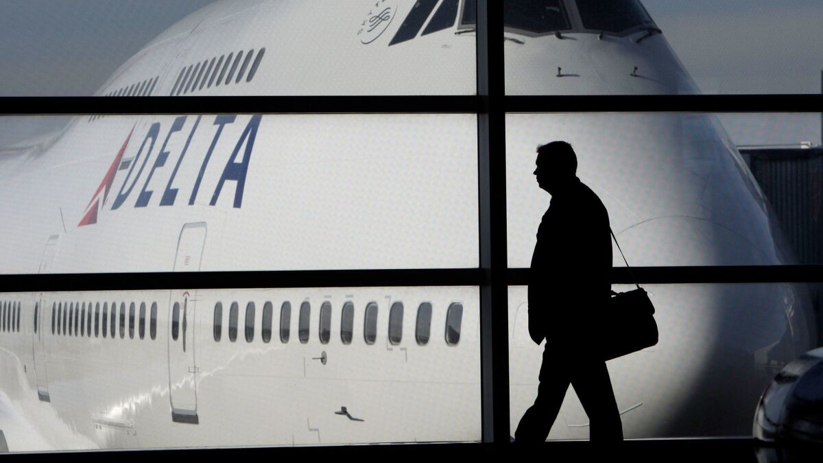 Delta CEO Edward Bastian said the carrier's automated system designed to reduce overbooking problems has been effective.