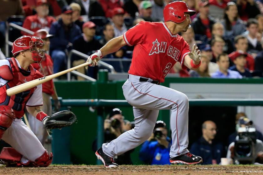 Angels pinch-hitter Raul Ibanez hits a three-run double in the eighth inning of the team's 4-2 win over the Washington Nationals on Monday.