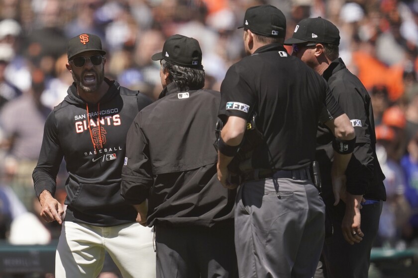 San Francisco Giants manager Gabe Kapler reacts toward the umpire crew after being ejected.