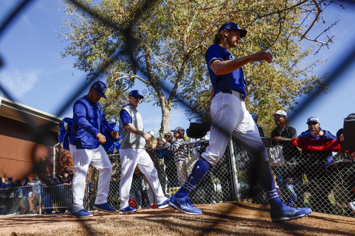 Dodgers pitcher Tyler Glasgow heads to the field on Feb. 15, 2024 for a spring training workout at Camelback Ranch.