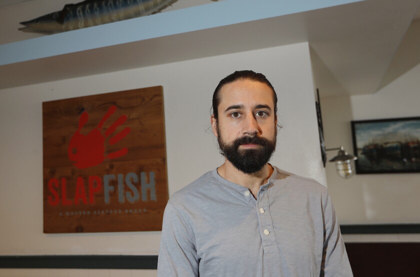 Slapfish founder and CEO Andrew Gruel in his Huntington Beach location.