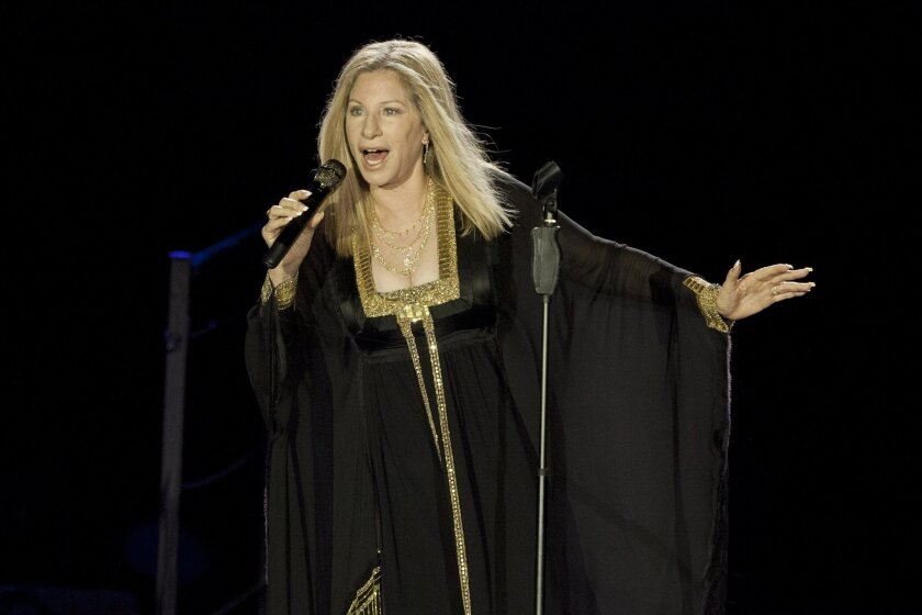 FILE - In this June 20, 2013 file photo, singer Barbra Streisand performs during her concert in Tel Aviv, Israel. Streisand's latest album, "Partners," was released on Tuesday, Sept. 16, 2014. (AP Photo/Dan Balilty, File)
