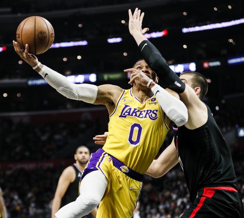 Time is running out on Lakers and Russell Westbrook - Los Angeles Times 2 Lakers guard Russell Westbrook goes up for a shot while Clippers center Ivica Zubac defends.