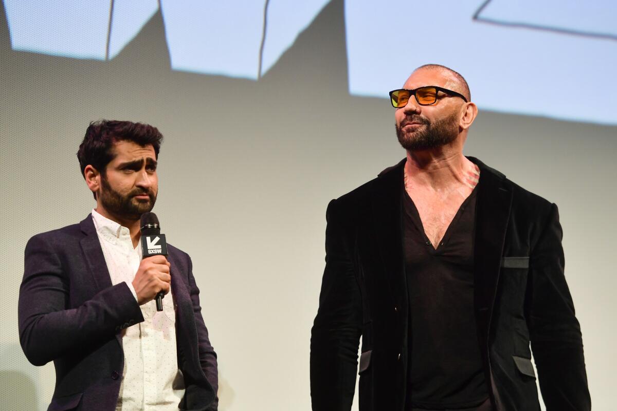 Kumail Nanjiani, left, and Dave Bautista attend the "Stuber" premiere at the 2019 SXSW Conference and Festival at Paramount Theatre on March 13 in Austin, Texas.