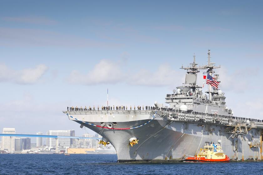 The USS Boxer, the flagship of the Boxer Amphibious Ready Group arrives at Naval Base San Diego, ending a seven-month deployment, November 27, 2019.
