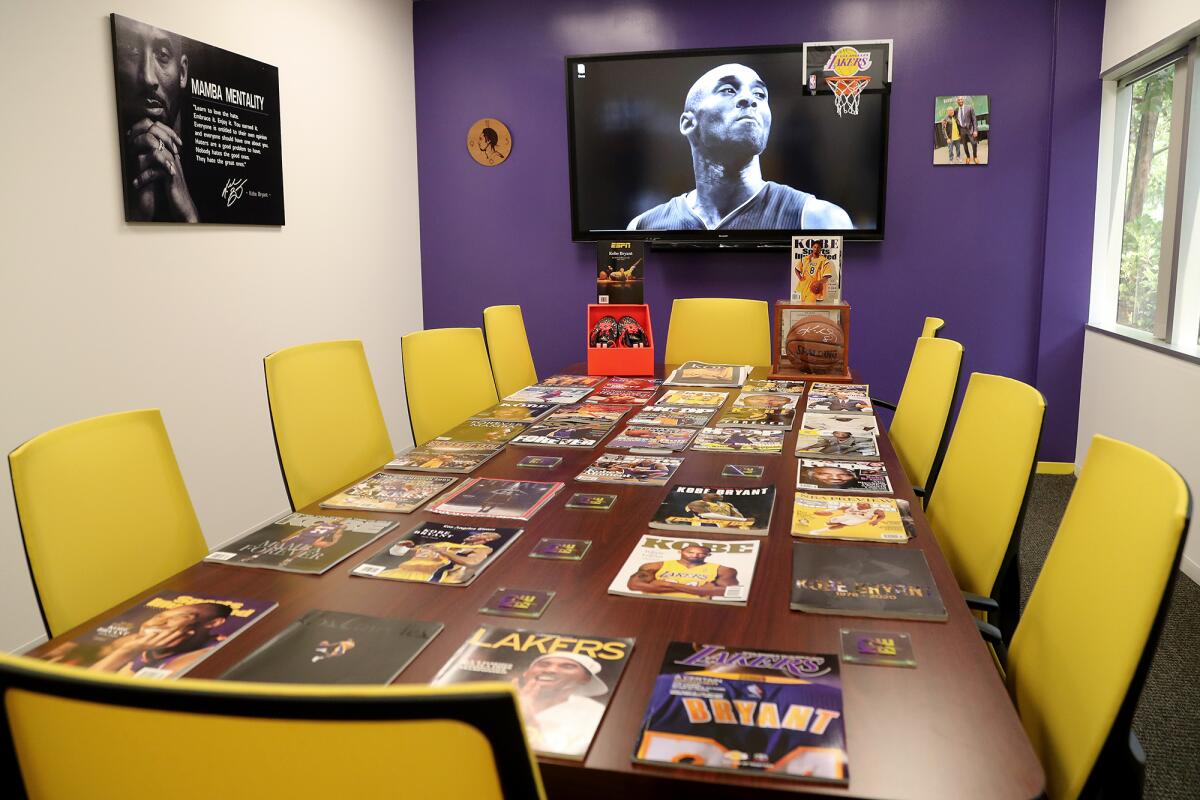 The conference room at Renovo Solutions is decorated in memorabilia of Los Angeles Lakers legend Kobe Bryant.