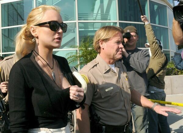 Lindsay Lohan leaves a court proceeding