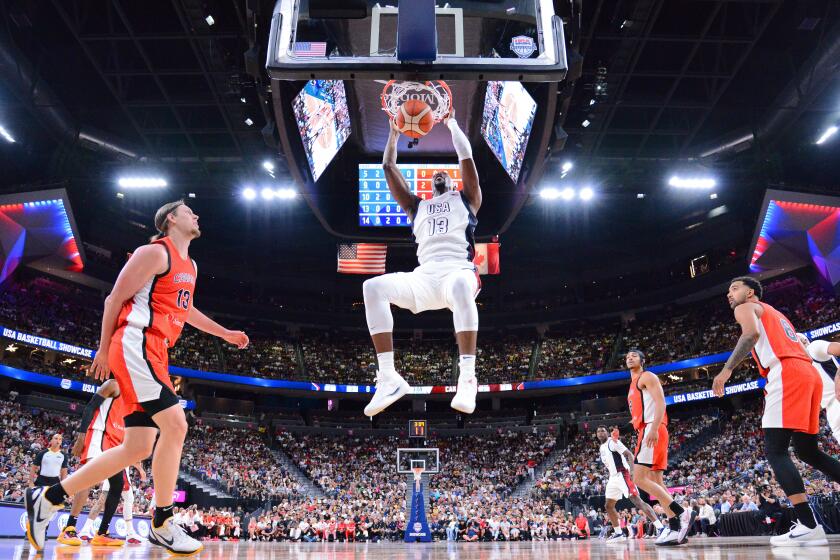 LAS VEGAS, NV - JULY 10: Bam Adebayo #13 of the USA Basketball Men's Team dunks the ball during the game against the Canada Basketball Men's Team on July 10, 2024 at the T-Mobile Arena in Las Vegas, Nevada. NOTE TO USER: User expressly acknowledges and agrees that, by downloading and/or using this Photograph, user is consenting to the terms and conditions of the Getty Images License Agreement. Mandatory Copyright Notice: Copyright 2024 NBAE (Photo by Brian Babineau/NBAE via Getty Images)