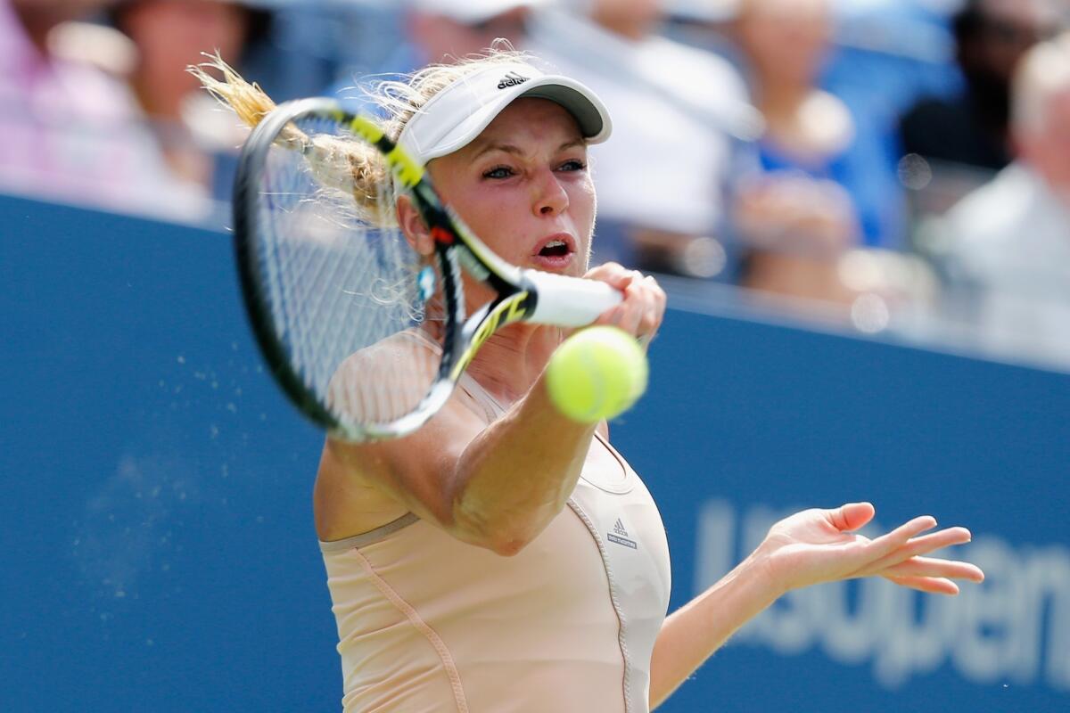 Caroline Wozniacki of Denmark will face Serena Williams in the U.S. Open women's singles final on Sunday at the Billie Jean King National Tennis Center in New York.