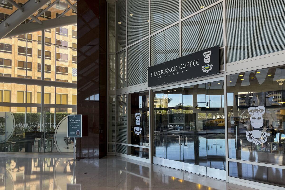 Entrance to Silverback Coffee, inside a glass building lobby