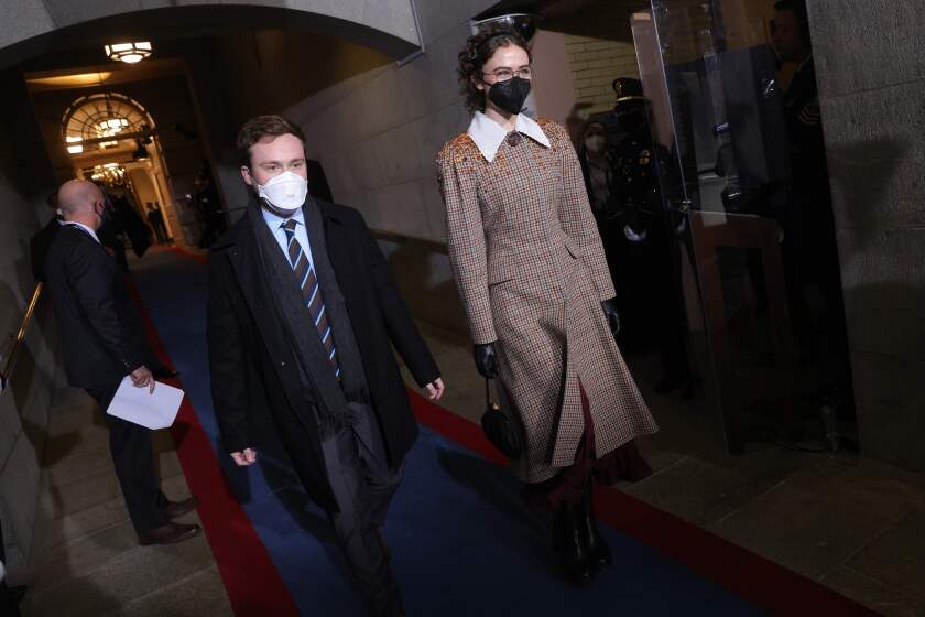 Cole Emhoff and Ella Emhoff, the stepchildren of Vice President-Elect Kamala Harris arrive during Joe Biden's inauguration.