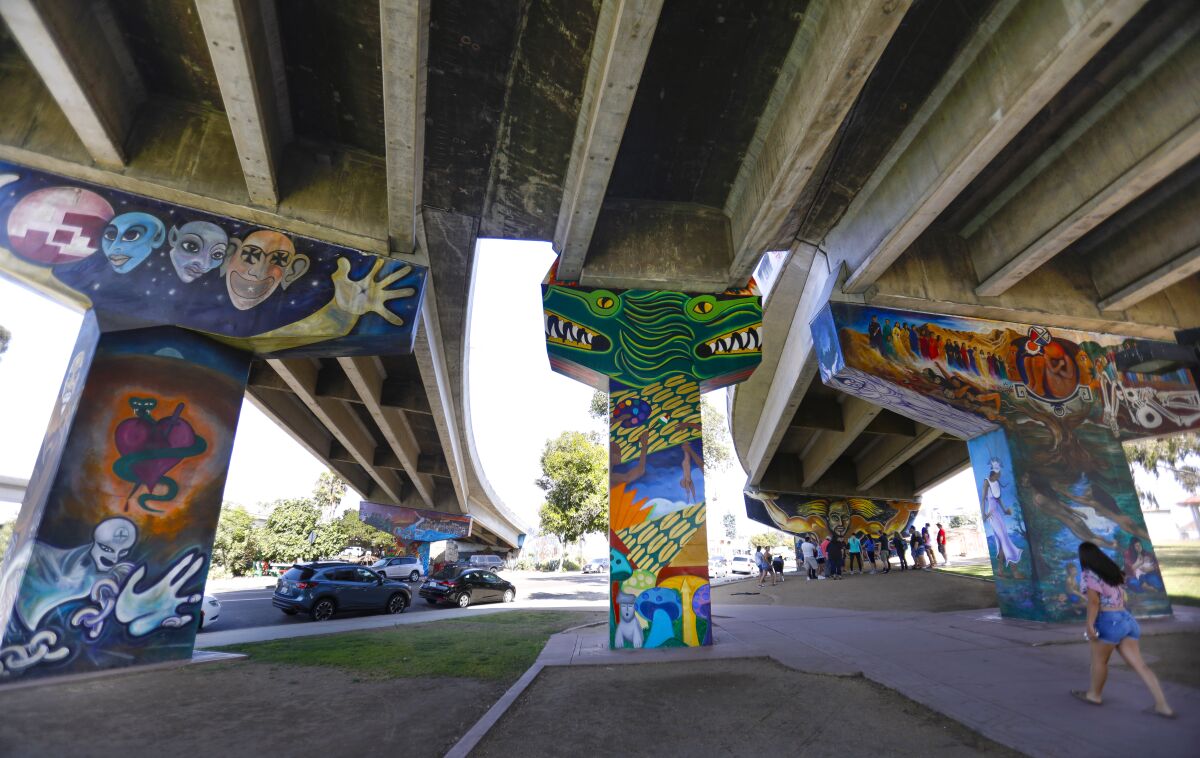 Murals adorn the sides of the columns supporting the portion of the San Diego-Coronado Bridge in Chicano Park.