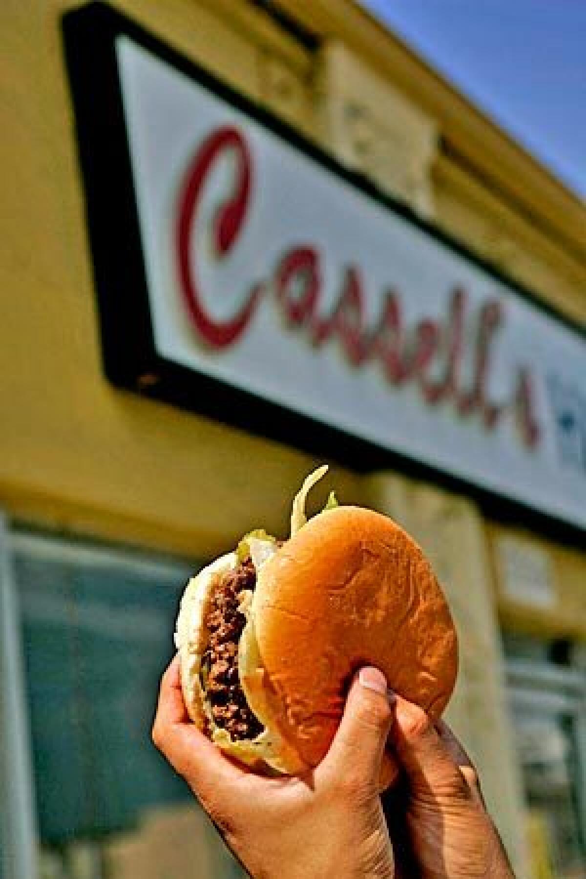 Al Cassell, who died last week at 98, was making "gourmet" burgers years ago.