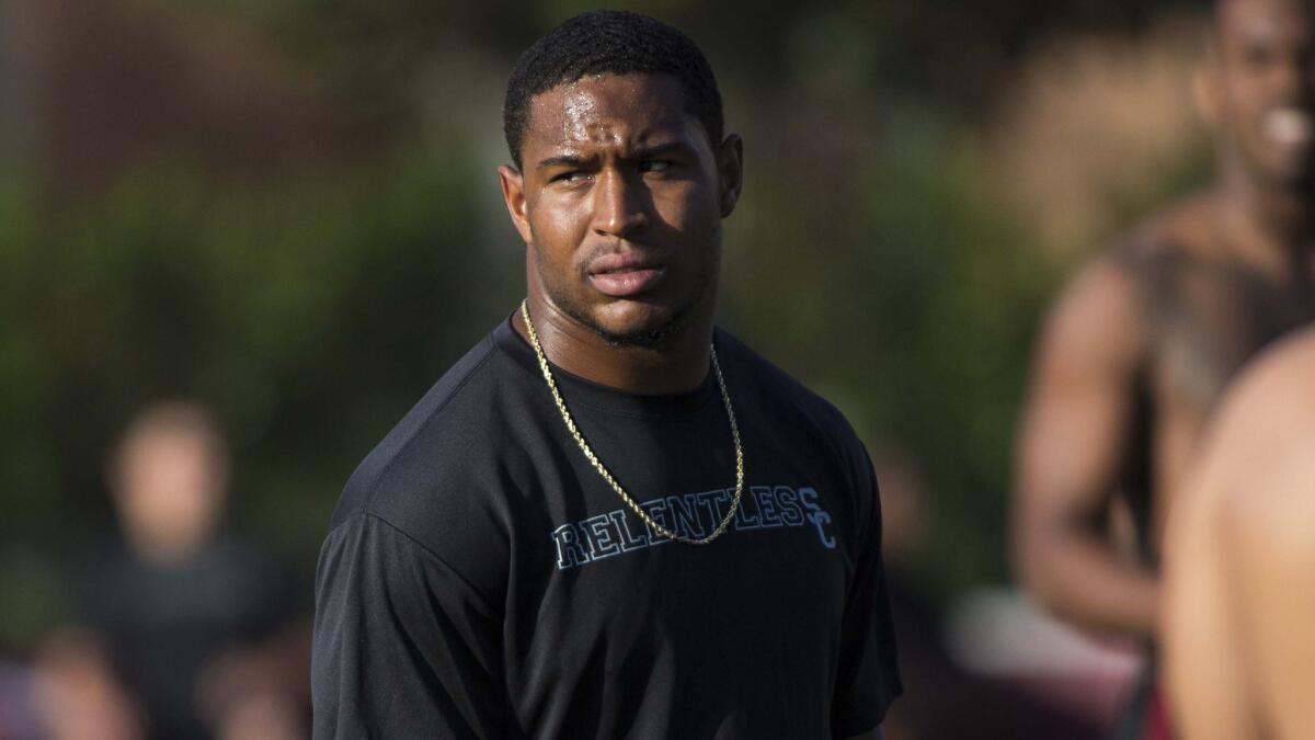 USC linebacker Hayes Pullard will sit out the first half of Saturday's game against Boston College after he was ejected during the Trojans' win Saturday.
