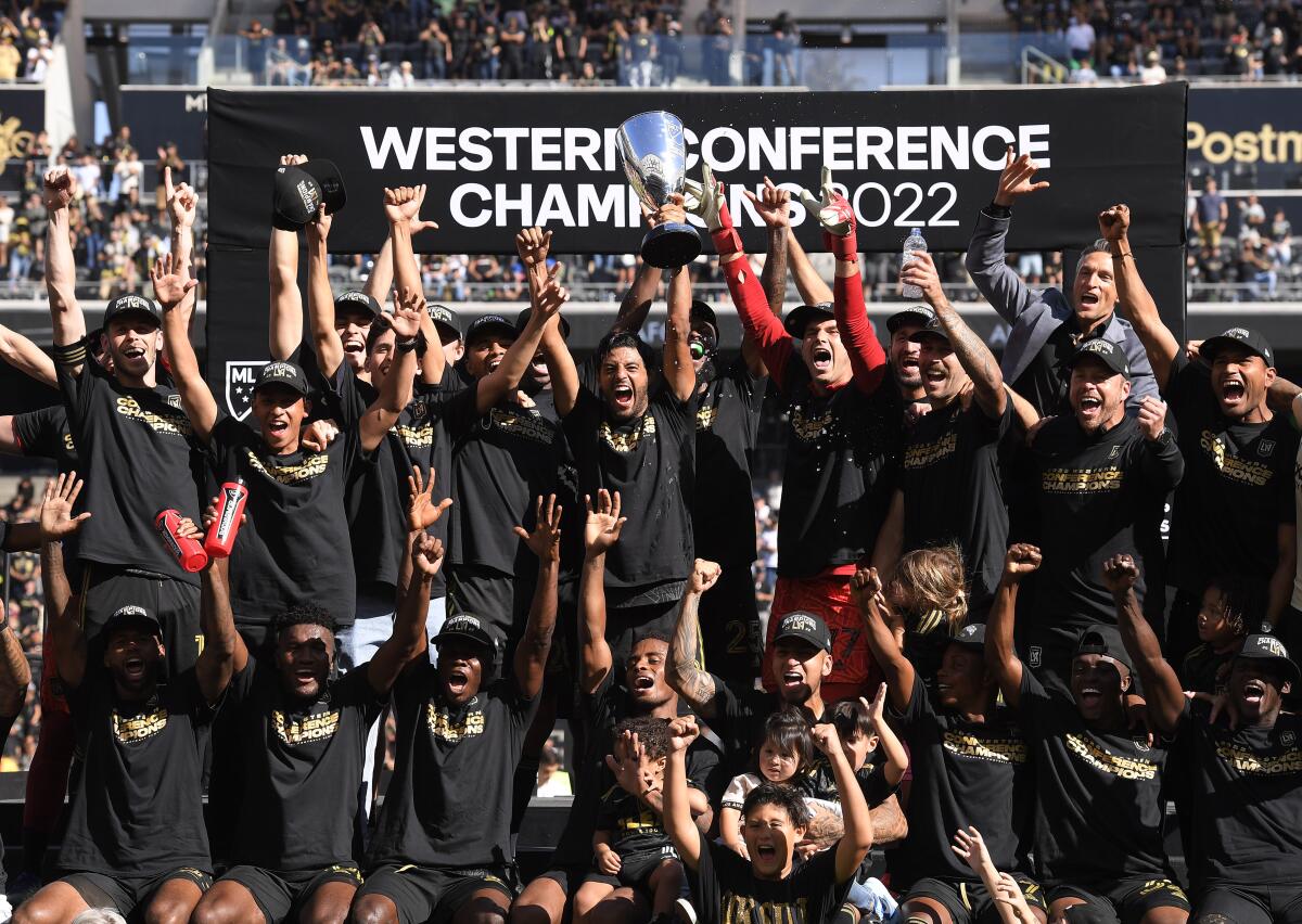LAFC players celebrate after defeating Austin FC 3-0 for the MLS Western Conference title.