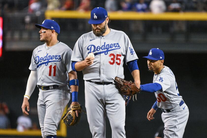 PHOENIX, AZ - October 11: Los Angeles Dodgers Lance Lynn reacts to being taken.