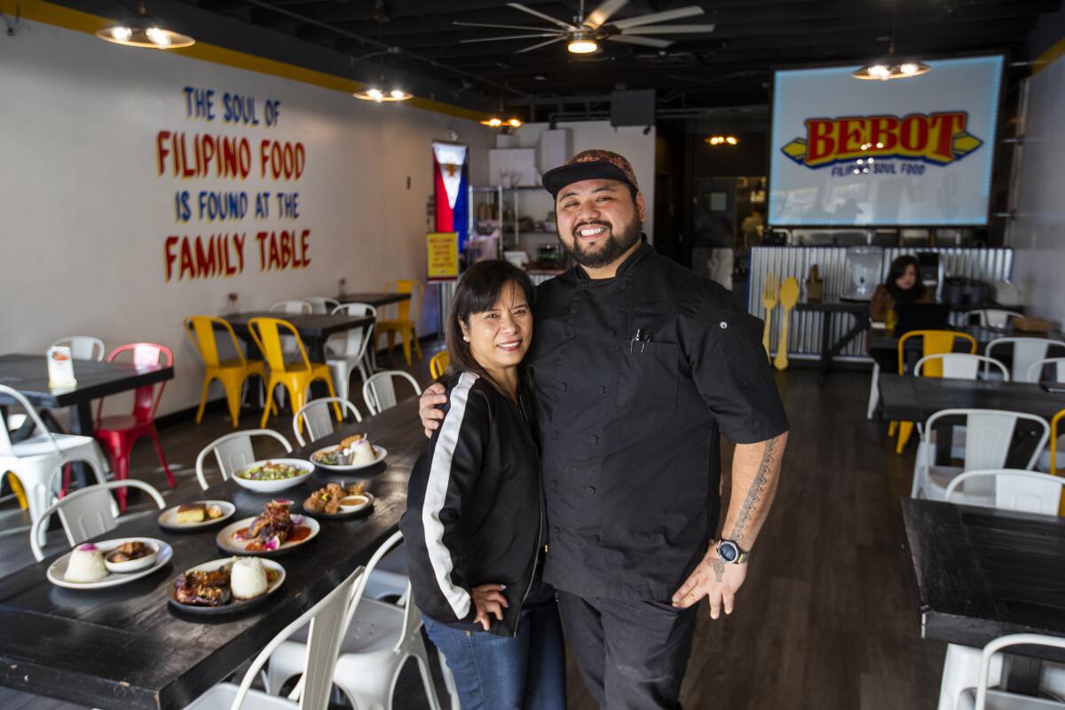 AC Boral, executive chef/owner, and his mom, Rose Boral, at Bebot Filipino Soul Food in Long Beach.