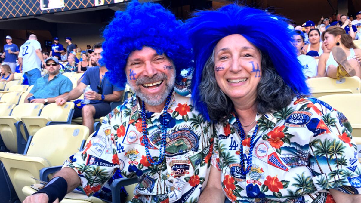 Sam and Bonnie Kane sport their unique Dodgers gear during Game 1 of the World Series.