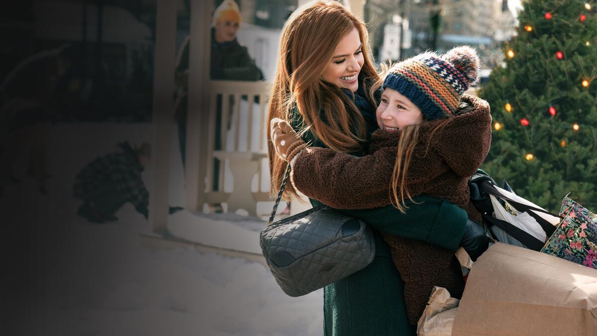 Isla Fisher and Willa Skye sharing a hug