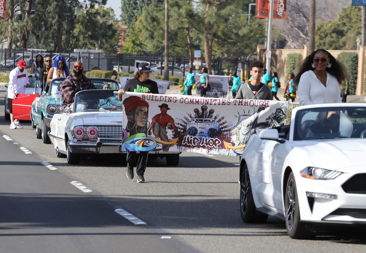 Hip-hop musical artists take part in the Orange County Black History Parade & Unity Fair.