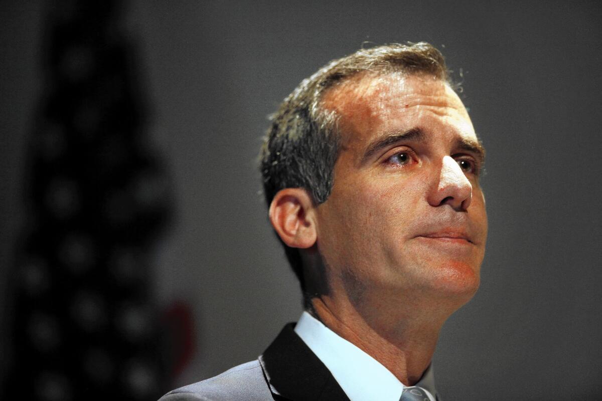 Los Angeles Mayor Eric Garcetti tears up at the Los Angeles Police Memorial Ceremony to honor officers killed in the line of duty. The majority of LAPD officers who cast ballots over the last week voted against a contract extension that had been reached with Garcetti and city negotiators