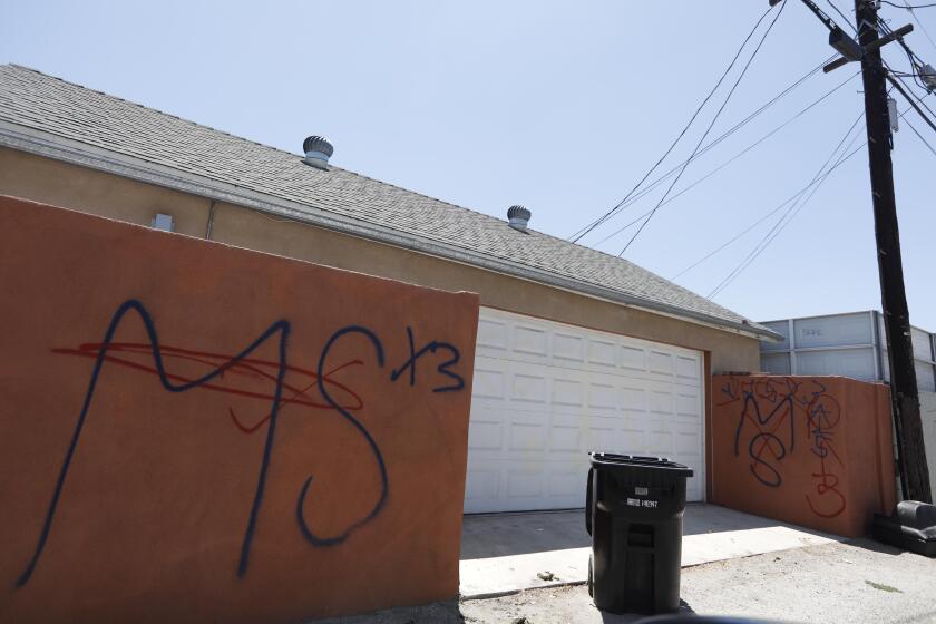 NORTH HOLLYWOOD, CA - JULY 17, 2019 - - MS-13 graffiti was tagged on a wall in an alley off Vanowen Street in North Hollywood on July 17, 2019. Several gruesome slayings have been attributed to the Fulton clique of MS-13 in North Hollywood in the last two years according to an indictment unsealed Tuesday that charged 22 members of the gang. (Photo By Genaro Molina / Los Angeles Times)