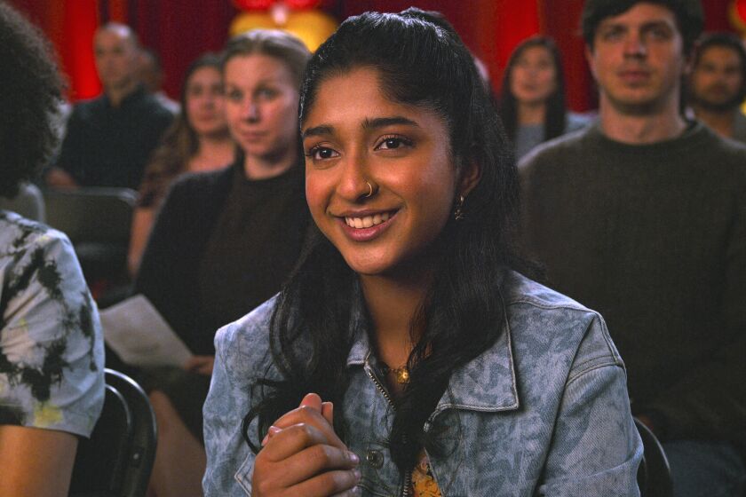 This image released by Netflix shows Maitreyi Ramakrishnan ain a scene from "Never Have I Ever." (Netflix via AP)