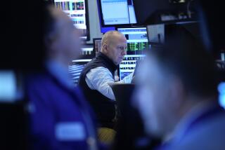 Traders work on the floor at the New York Stock Exchange in New York, Wednesday, Jan. 24, 2024. (AP Photo/Seth Wenig)