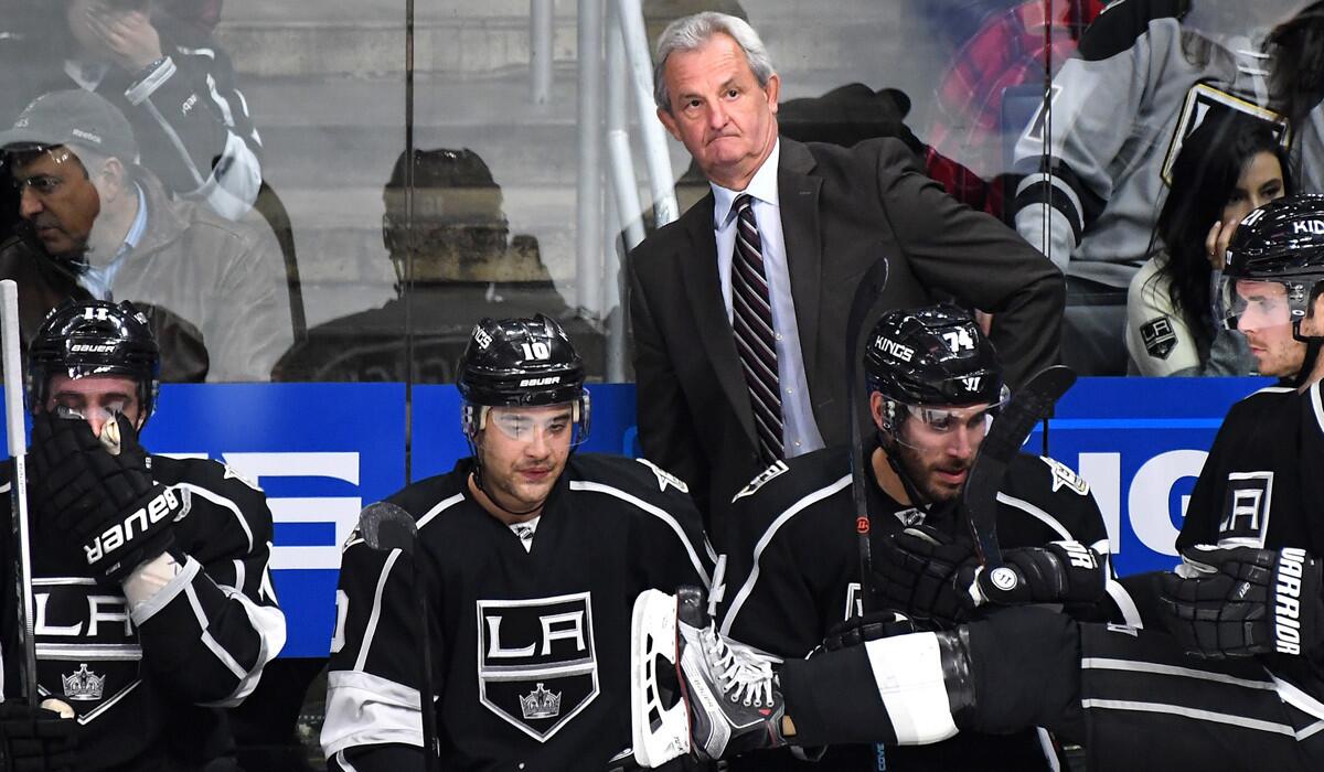 Kings Coach Darryl Sutter watches the team take on the San Jose Sharks at Staples Center on Nov. 30.