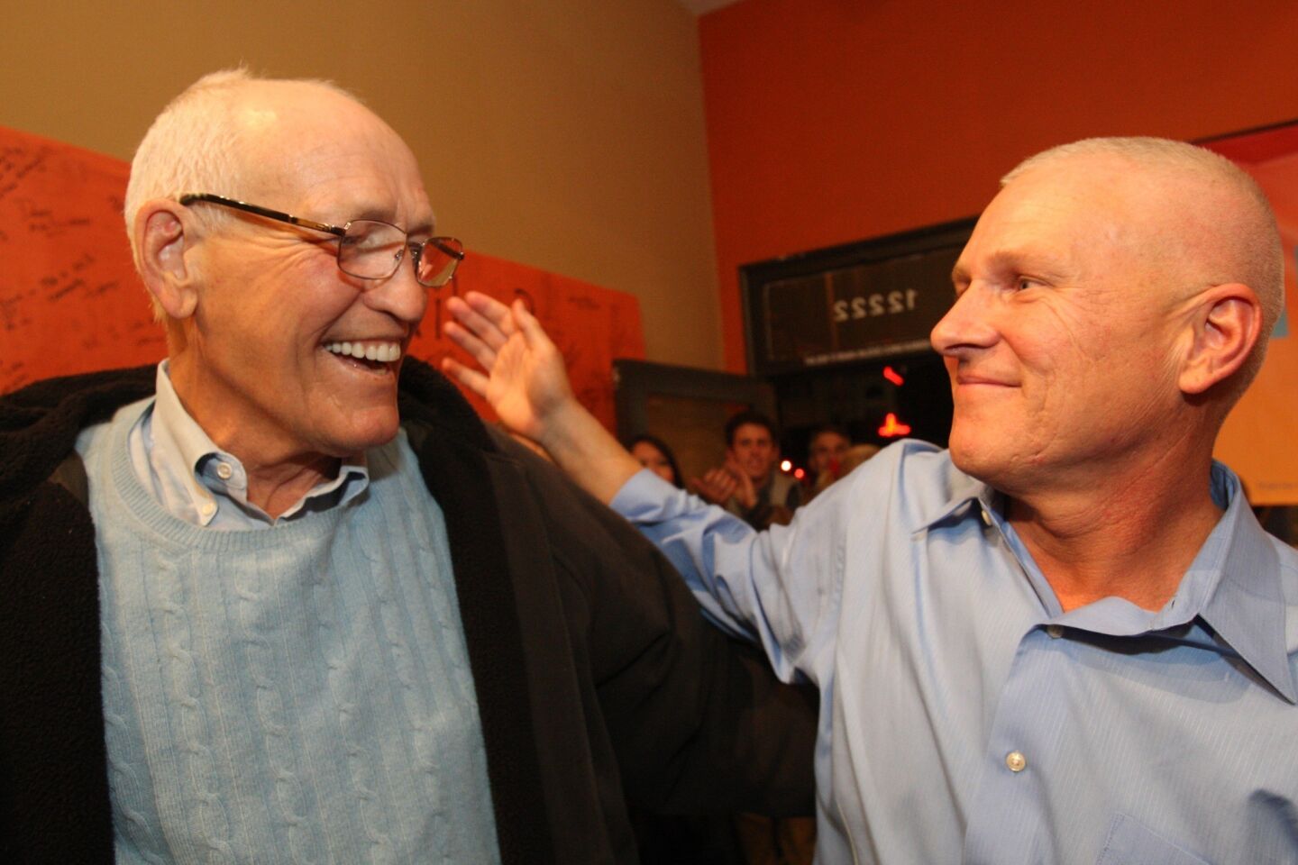 Los Angeles City Council candidate Mike Bonin, right, is shown with current City Councilman Bill Rosendahl at Bonin's election-night headquarters party in Mar Vista.