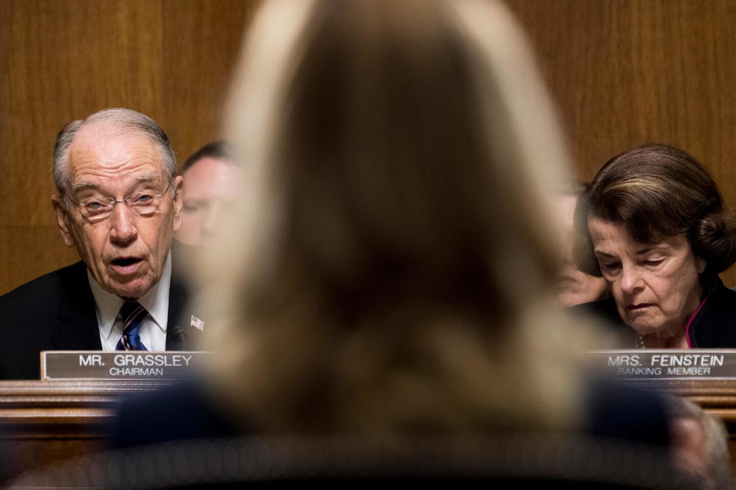 Senate Judiciary Committee chairman Charles Grassley, left, with Senator Dianne Feinstein, right, gives a preliminary statement before Christine Blasey Ford, the woman accusing Supreme Court nominee Brett Kavanaugh of sexually assaulting her at a party 36 years ago.