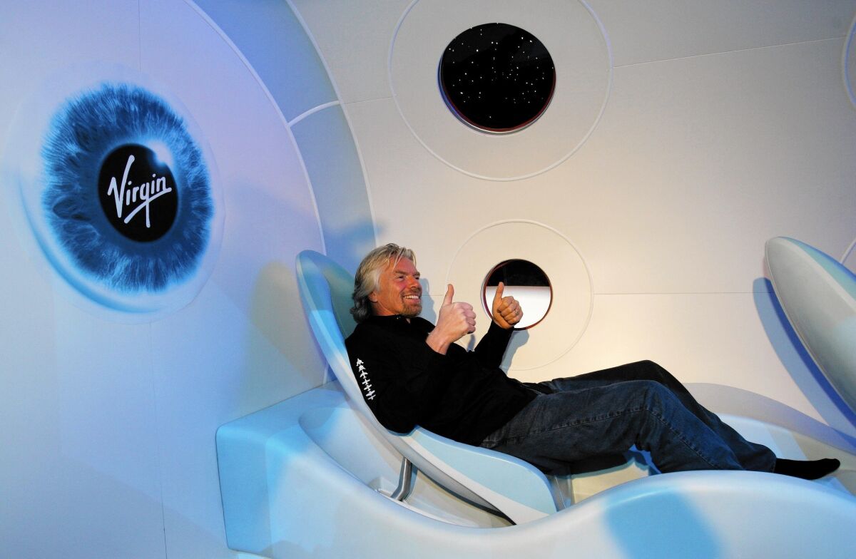 Despite the crash of its test flight last year, Richard Branson’s Virgin Galactic is forging ahead with plans to fly tourists to space. Above, Branson at the 2006 unveiling of Virgin Galactic’s SpaceShipTwo.