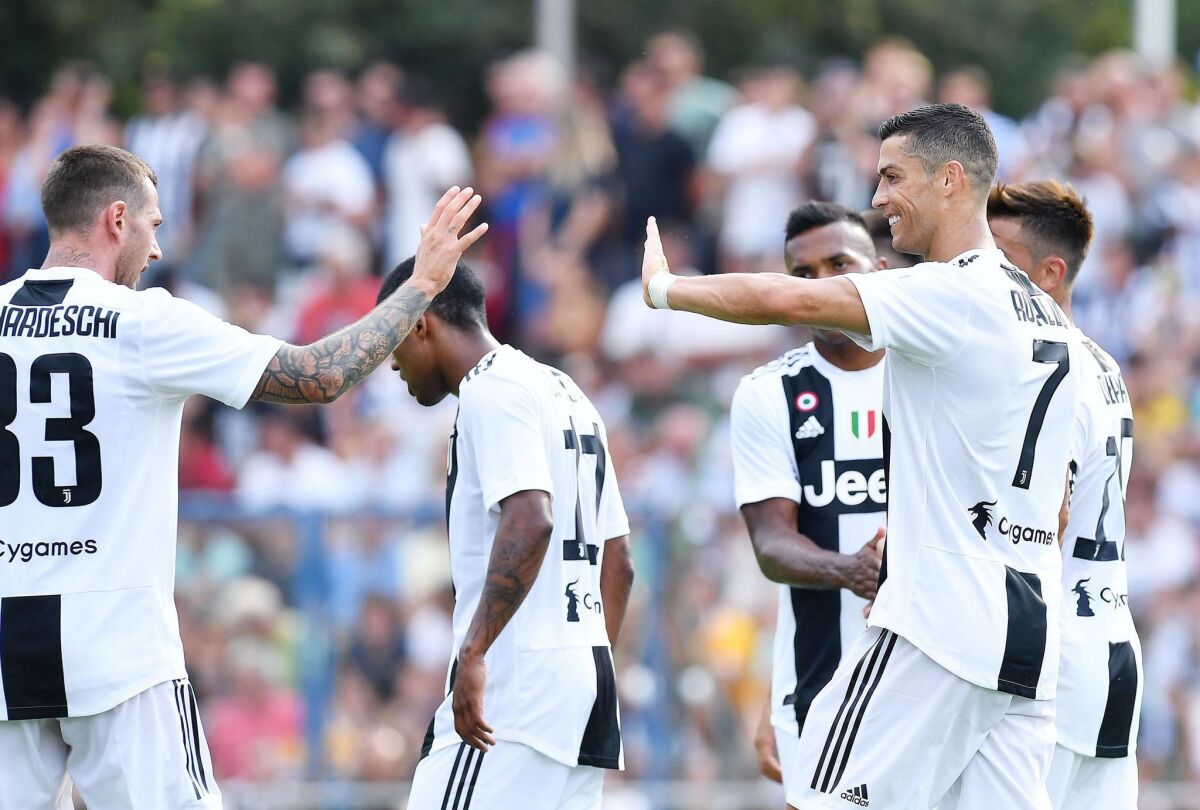 Juventus' Cristiano Ronaldo (R) celebrates with teammates during a soccer friendly match between Juvents A and Juventus B at Villar Perosa, Turin, 12 August 2018.