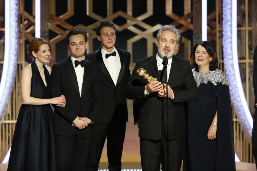 This image released by NBC shows filmmaker Sam Mendes accepting the award for best motion picture drama for "1917" at the 77th Annual Golden Globe Awards at the Beverly Hilton Hotel in Beverly Hills, Calif., on Sunday, Jan. 5, 2020. (Paul Drinkwater/NBC via AP)