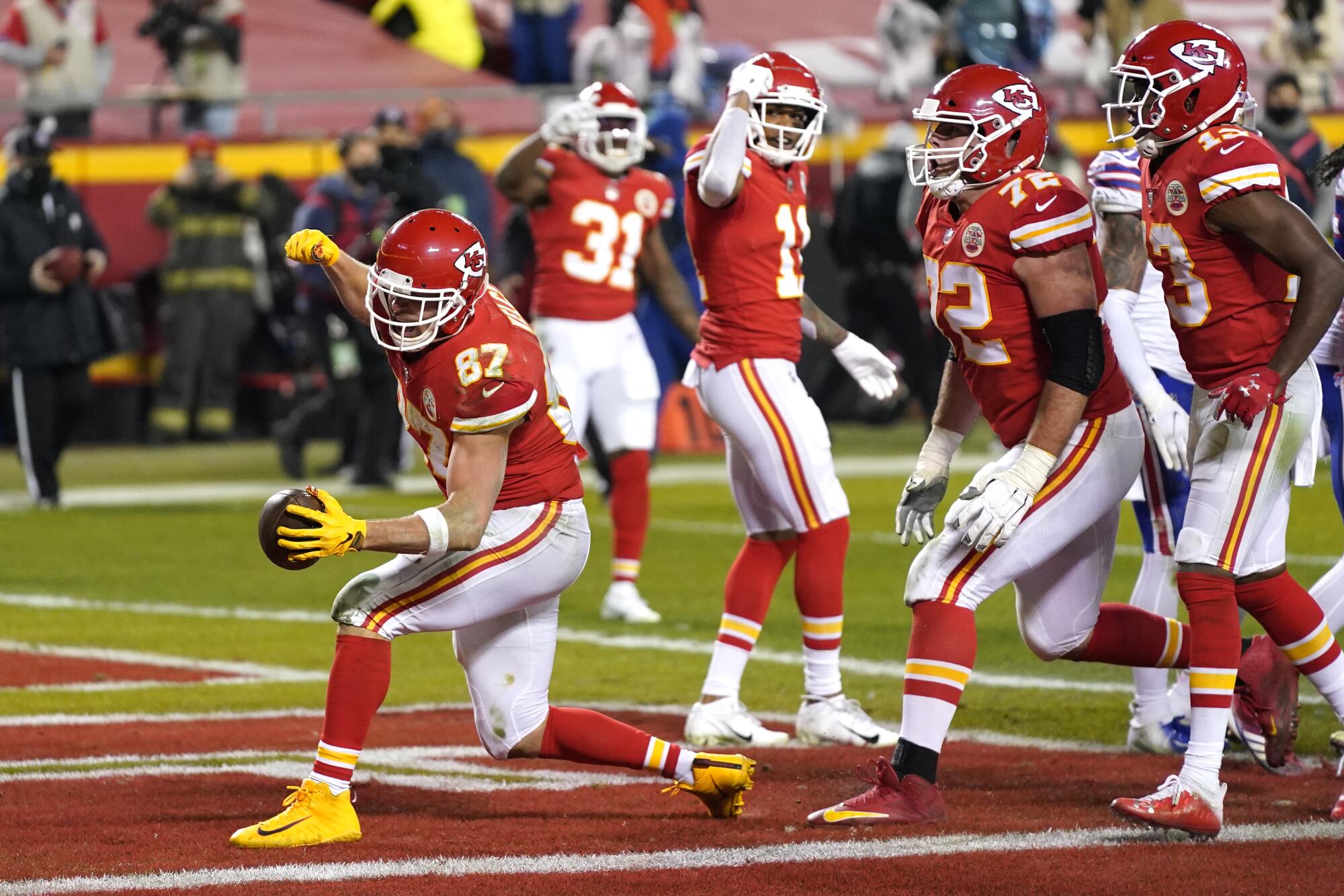 Kansas City Chiefs tight end Travis Kelce (87) celebrates after catching a one-yard touchdown pass.