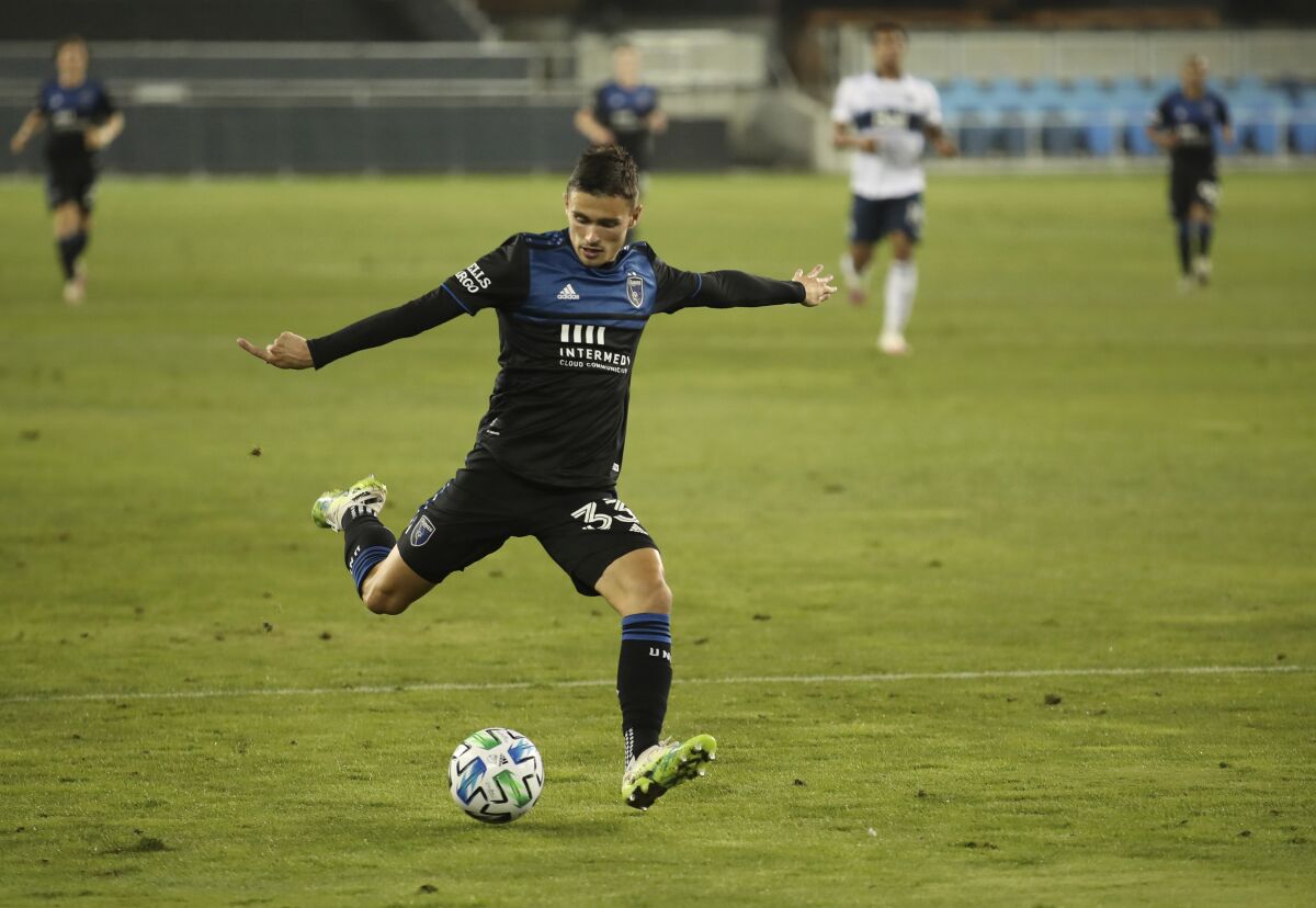 San Jose Earthquakes' Paul Marie kicks a goal against the Vancouver Whitecaps during the second half of an MLS soccer match Wednesday, Oct. 7, 2020, in San Jose, Calif. (AP Photo/Josie Lepe)