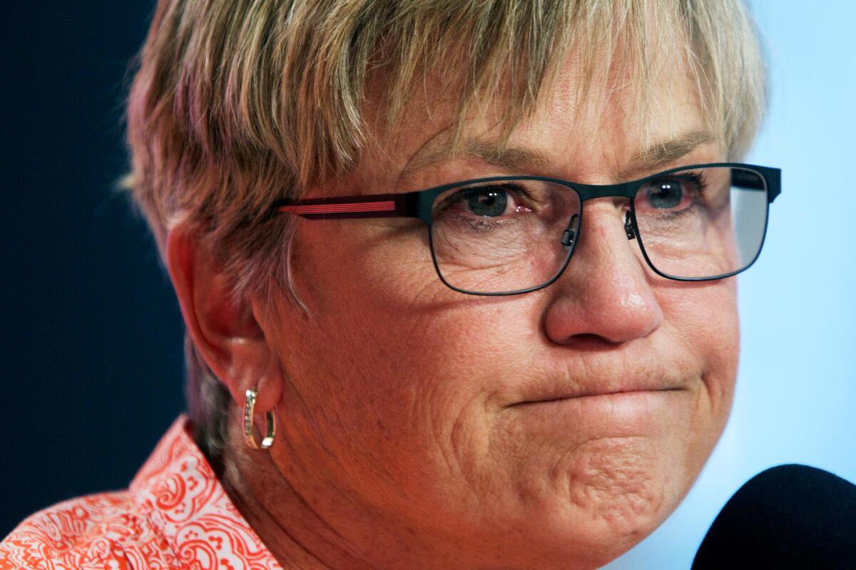 Tennessee women's basketball head coach Holly Warlick speaks about former coach Pat Summitt during a news conference Tuesday, June 28, 2016, in Knoxville, Tenn. Summitt, the winningest coach in Division I college basketball history who uplifted the women's game from obscurity to national prominence during her career at Tennessee, died Tuesday. She was 64. Warlick calls the impact Summitt had on her life "profound." (AP Photo/Wade Payne)