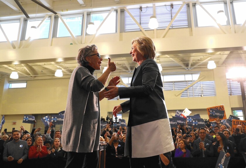Sen. Barbara Boxer, left, and Democratic presidential candidate Hillary Clinton embrace during a campaign rally in Oakland.