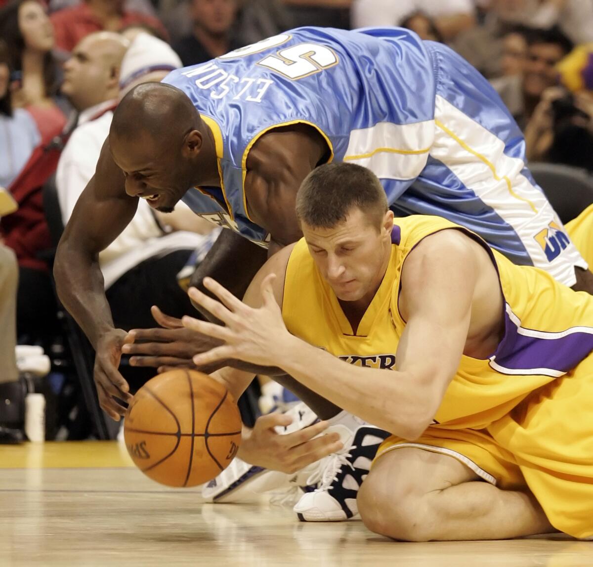 Slava Medvedenko tries to grab the basketball for the Lakers.