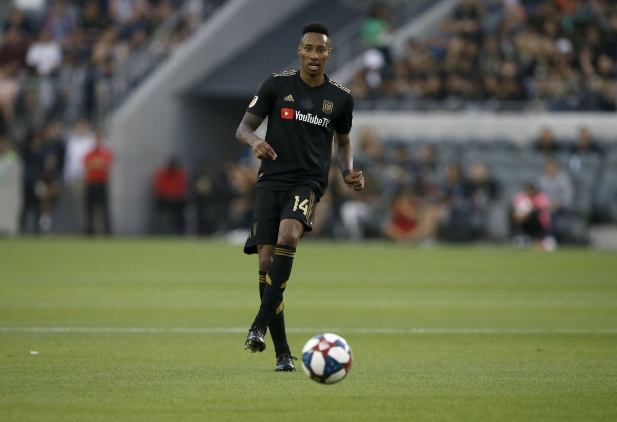 LAFC midfielder Mark-Anthony Kaye passes the ball against the Vancouver Whitecaps in Los Angeles on July 6, 2019.