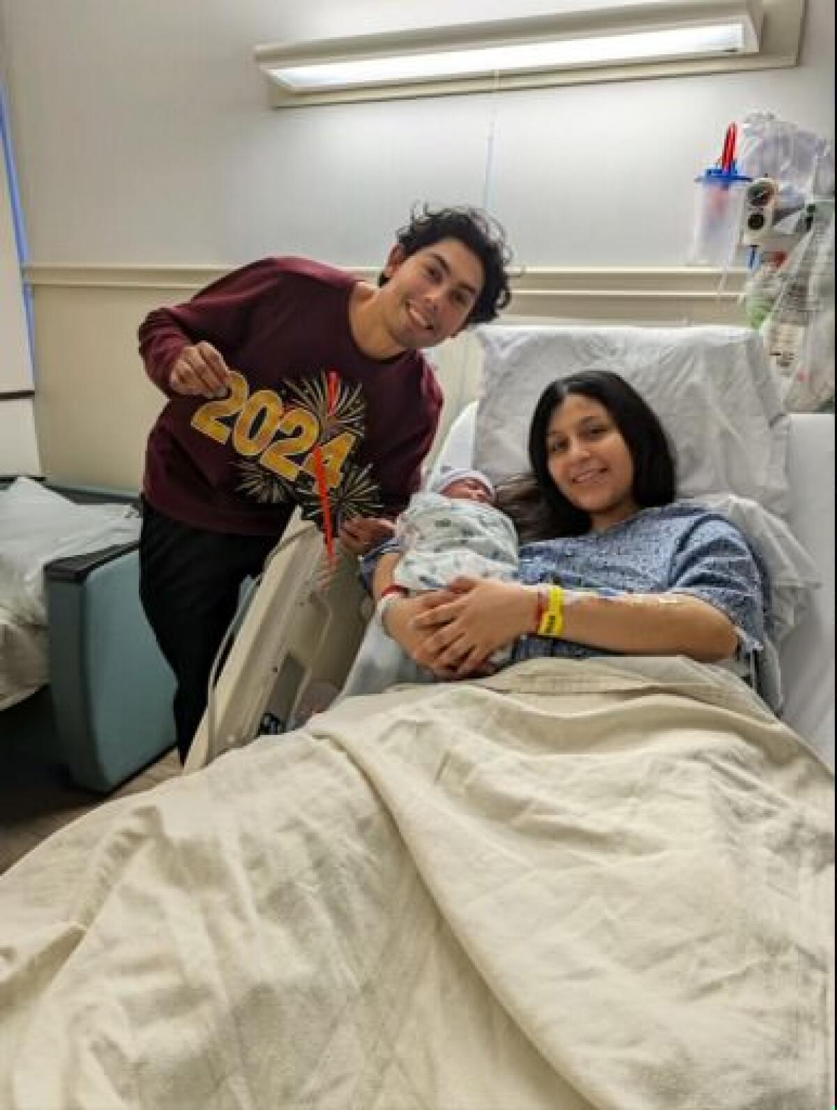 Angel and Meleni Morales with their newborn baby, Luka Morales.