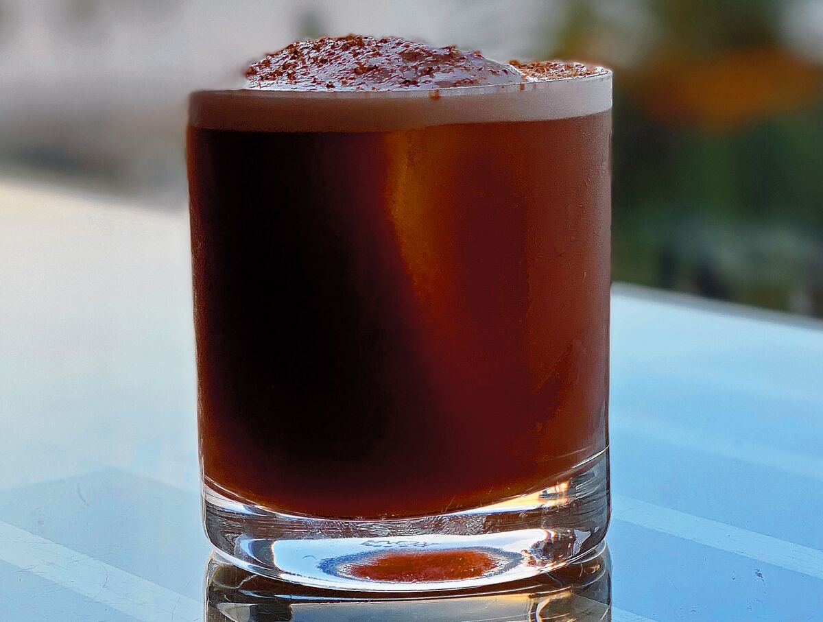 Holiday drinks at George’s California Modern in La Jolla include the Nocino Sour.