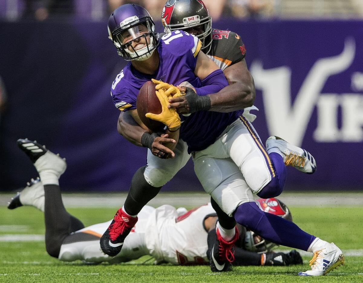 Vikings receiver Adam Thielen makes a catch against the Buccaneers during a game on Sept. 24.