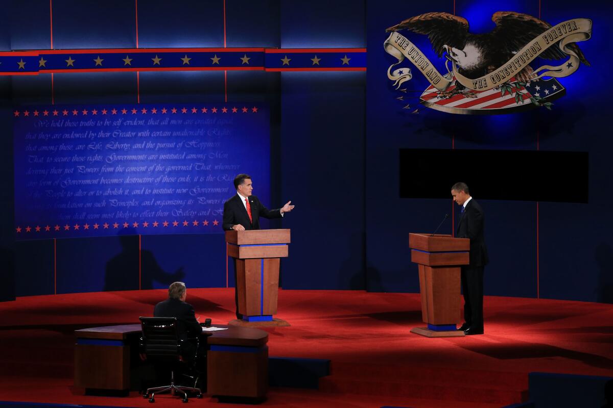 Mitt Romney and President Obama during their first presidential debate at the University of Denver.