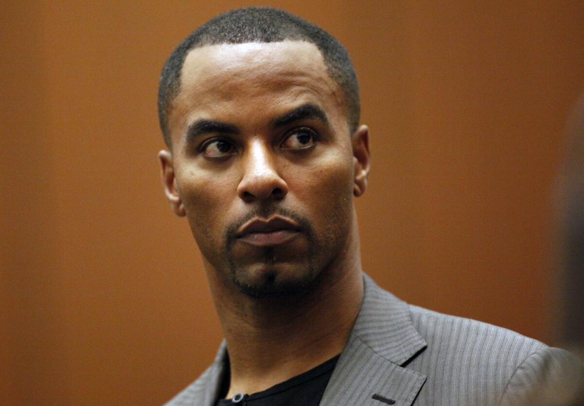 A federal judge Monday ordered former NFL player Darren Sharper, pictured here at a court hearing in Los Angeles, be sent to Louisiana.